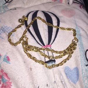 A gold chain belt